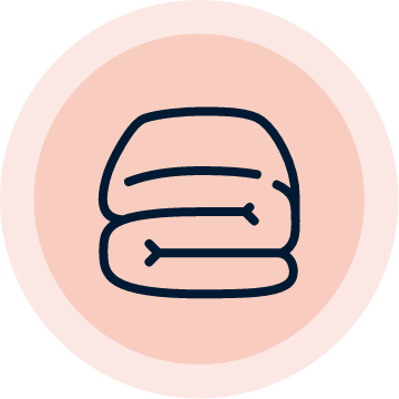 Icon of a folded blanket in a pink circle.